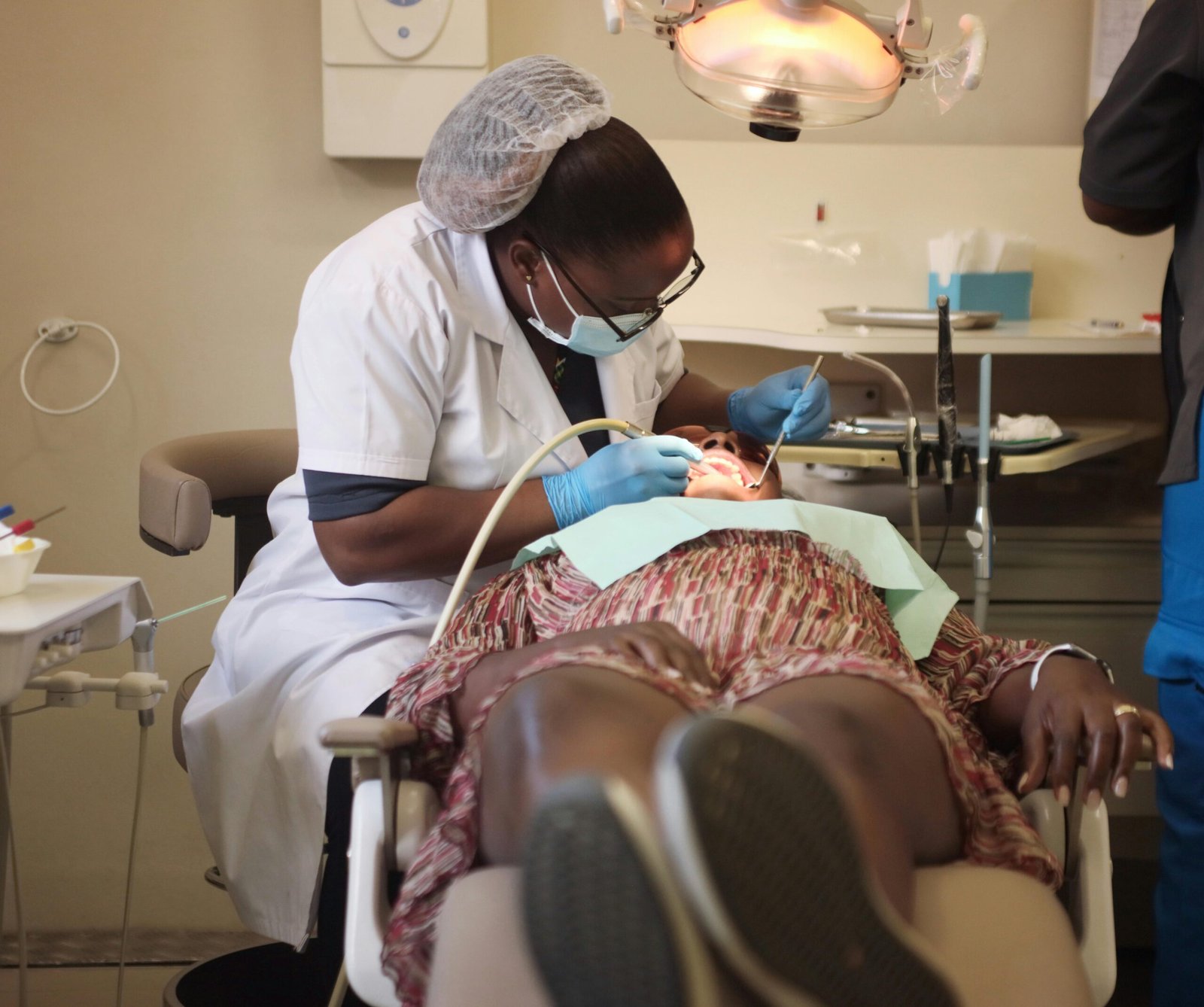 Woman in Dentist Chair During Procedure